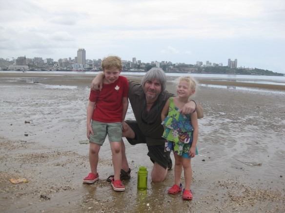 Charlotte, Seamus, and I with Maputo in the background